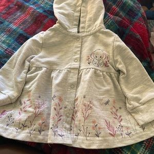 This features a delightful design with an adorable Dumbo right side for baby.